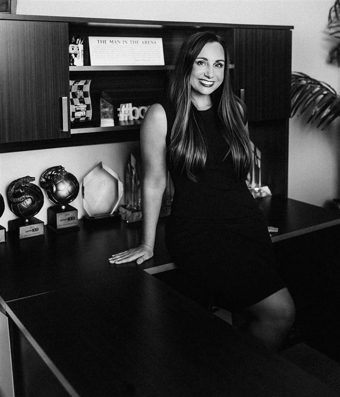 Professional headshot of Whitney, Ricci Insurance Group's Founder and President